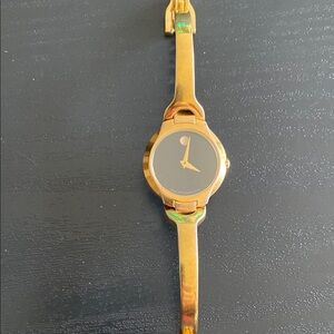 Gold and Black Smartwatch with Minimalist Design